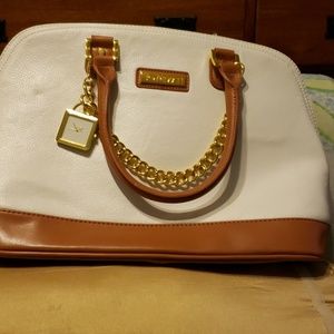 Nearly new  white and tan leather bag.